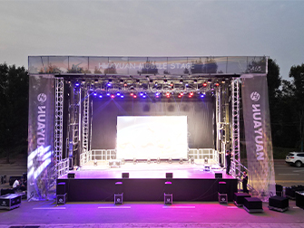 Front view of HY-S465 V2.0 mobile stage semi-trailer with stage unfolded